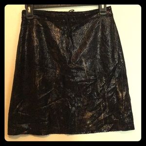 Betsey Johnson Snakeskin print size petite skirt.